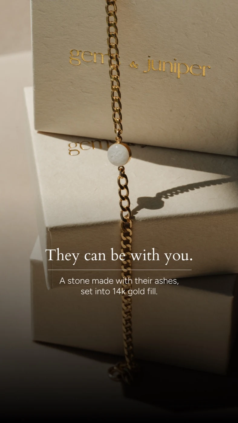 Gold Gems & Juniper bracelet beside its presentation packaging