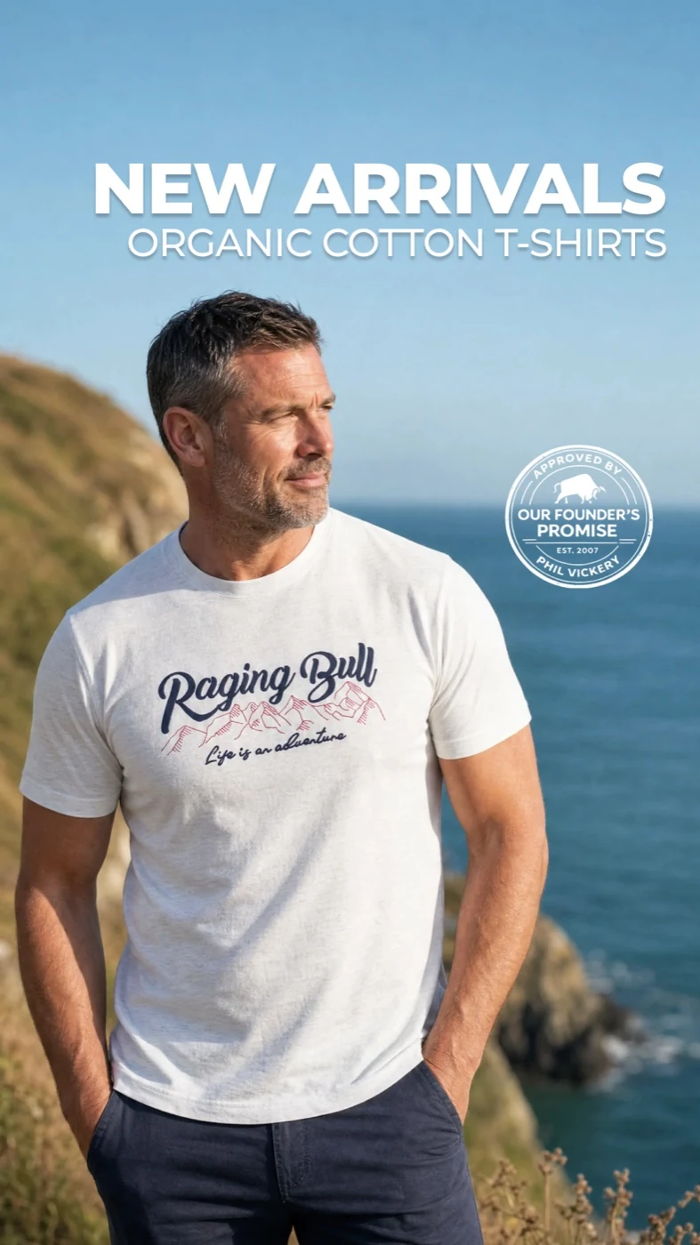 Raging Bull organic-cotton T-shirt styled against a sunny coastal backdrop